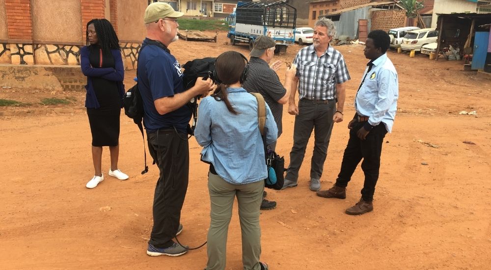 Bill Mosher, Visionaries Founder, with The Rev. Victor H. Kazanjian, Jr., URI Executive Director, Nyombi Tazan Jaffar, AFFCAD Co-Founder, and team