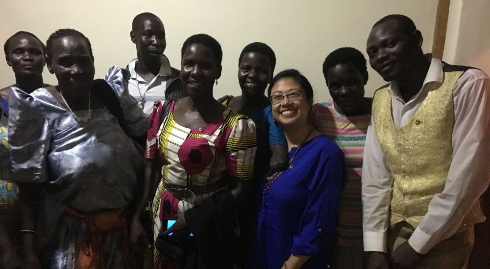 Sylvia Acan and the Golden Women Vision team with Isabelle Ortega-Lockwood, URI Director of Global Communications and Strategic Planning