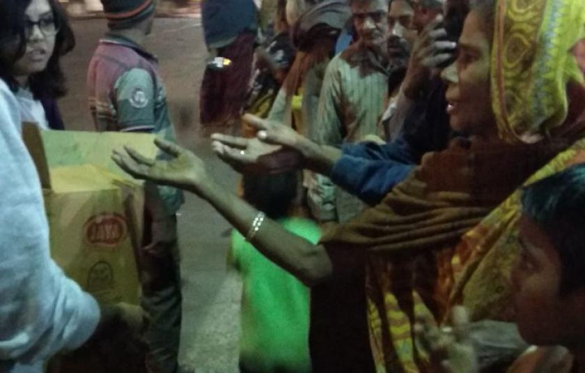 Giving Christmas Cakes to Kolkata Homeless