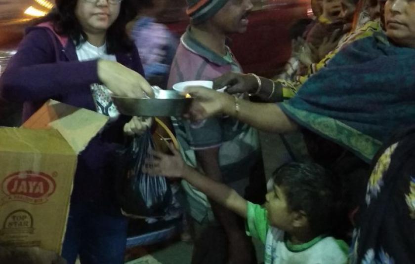 Giving Christmas Cakes to Kolkata Homeless