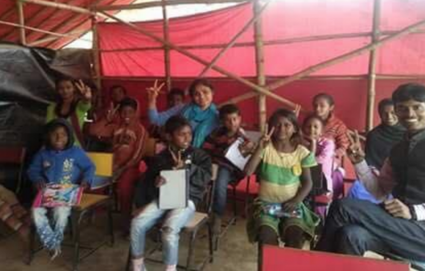 URI North India - Schoolchildren receive desks