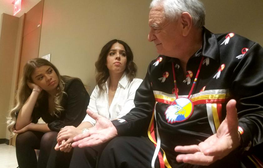 Emerald Stanton and Laila Galarsa with Indigenous Elder Chief Phil Lane, Jr. 