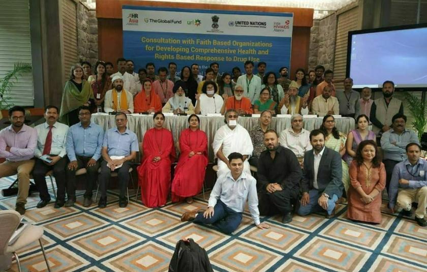 Photo: A group of people posing for camera