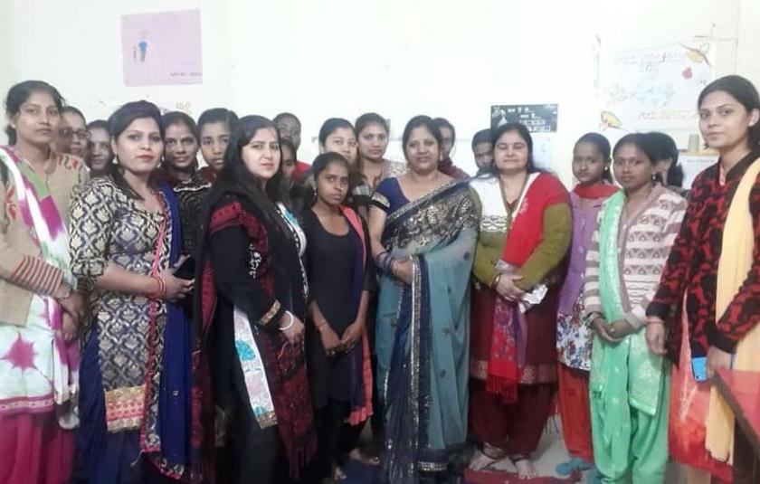 A group of women being felicitated.