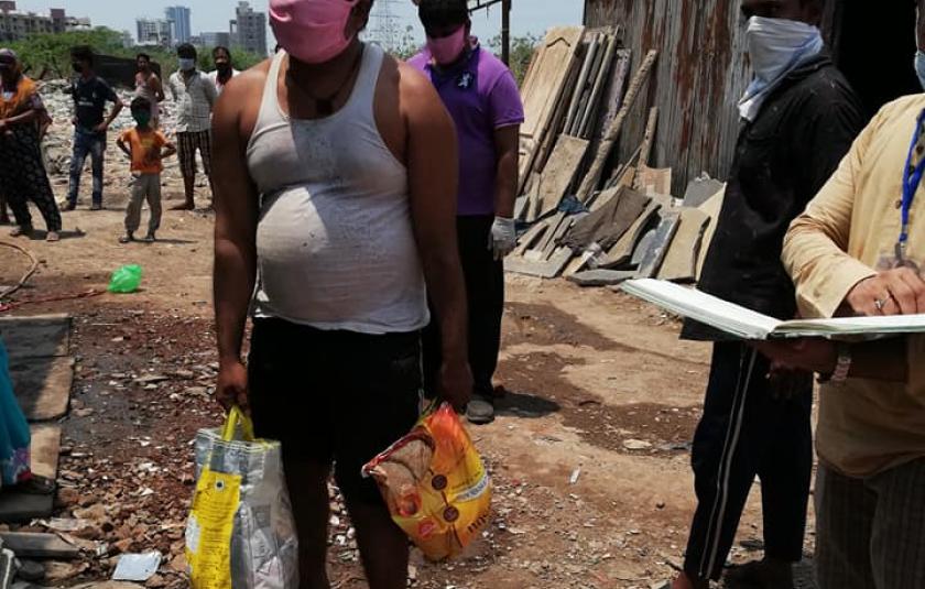 Delivering Rations Among Mumbai Colony Residents