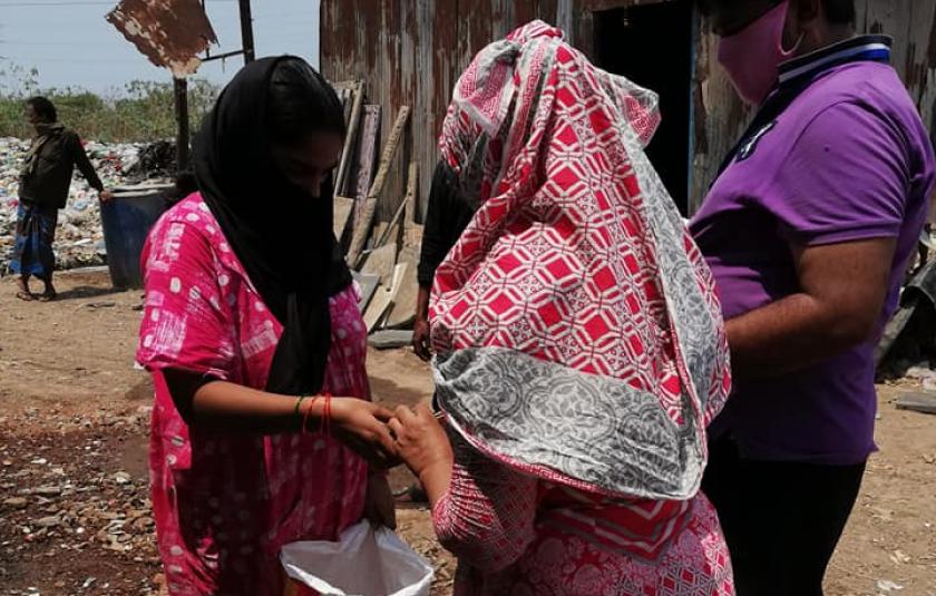 Delivering Rations Among Mumbai Colony Residents