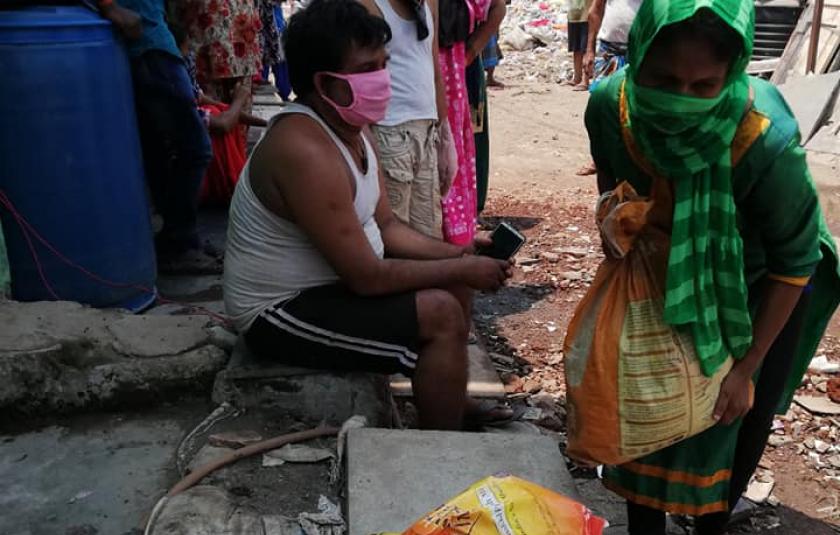 Delivering Rations Among Mumbai Colony Residents