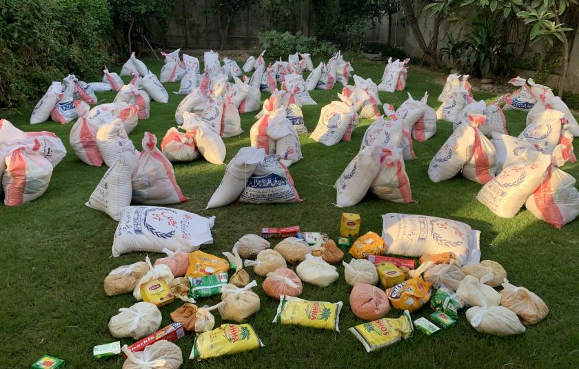 Photo: image of bags of donations gathered and distributed by URI members during the COVID-19 pandemic.
