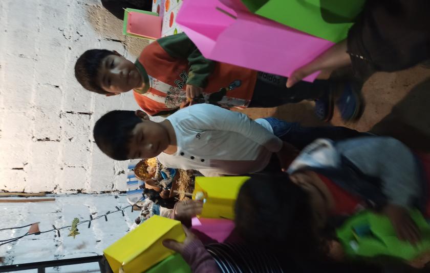 Photo: Children receiving the presents 