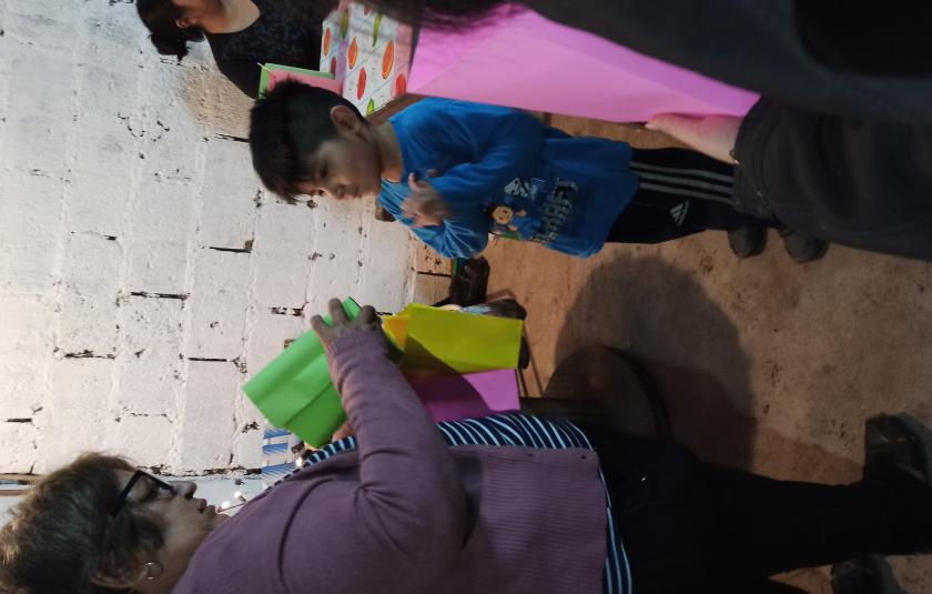 Photo: Children receiving the presents 