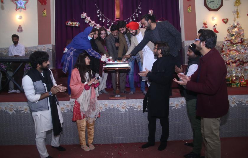 Photo: People cutting cake 