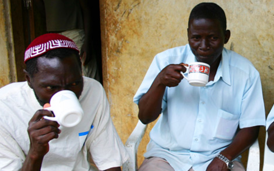 two youth blacks drinking coffee