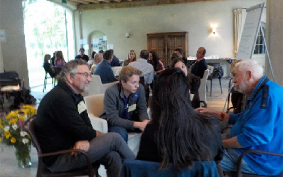 group photo in circle of discussing certain matters wit victor
