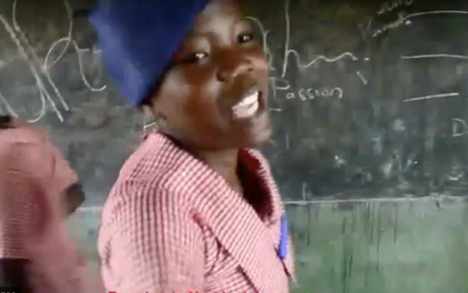 Young Lady participating in a leadership project at a school