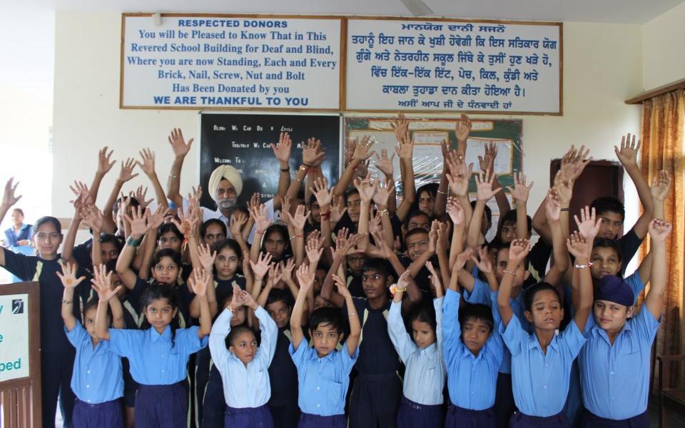 Karaminder Singh and Children.jpg