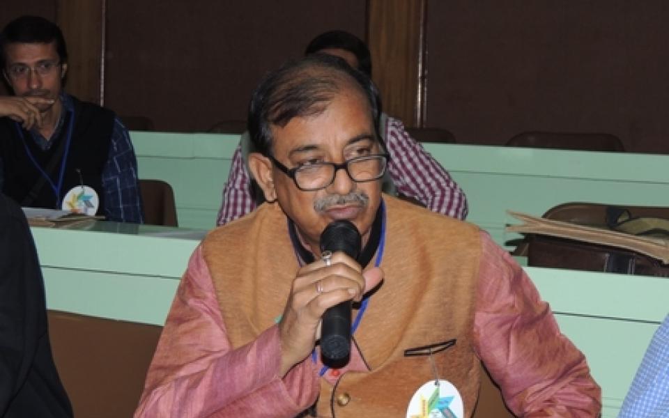 man speaking on a microphone