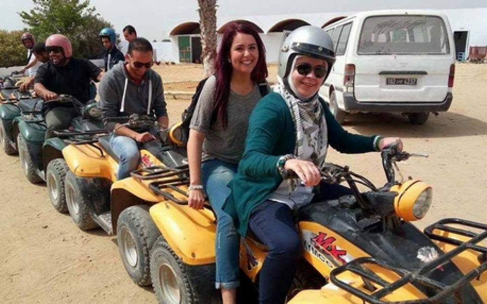 young women and men outdoor having fun