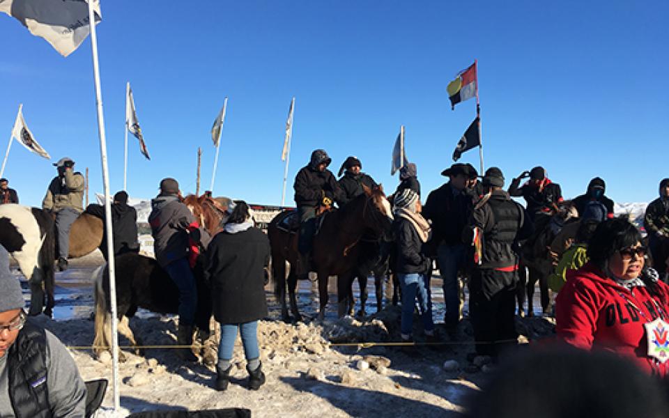 people outdoor holding flags