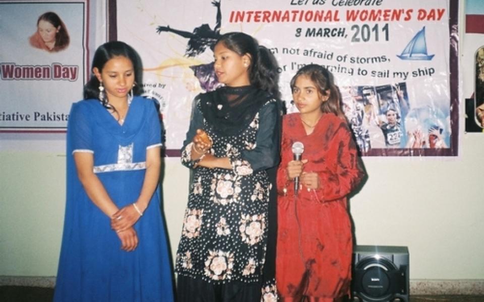 three girls in a group photo