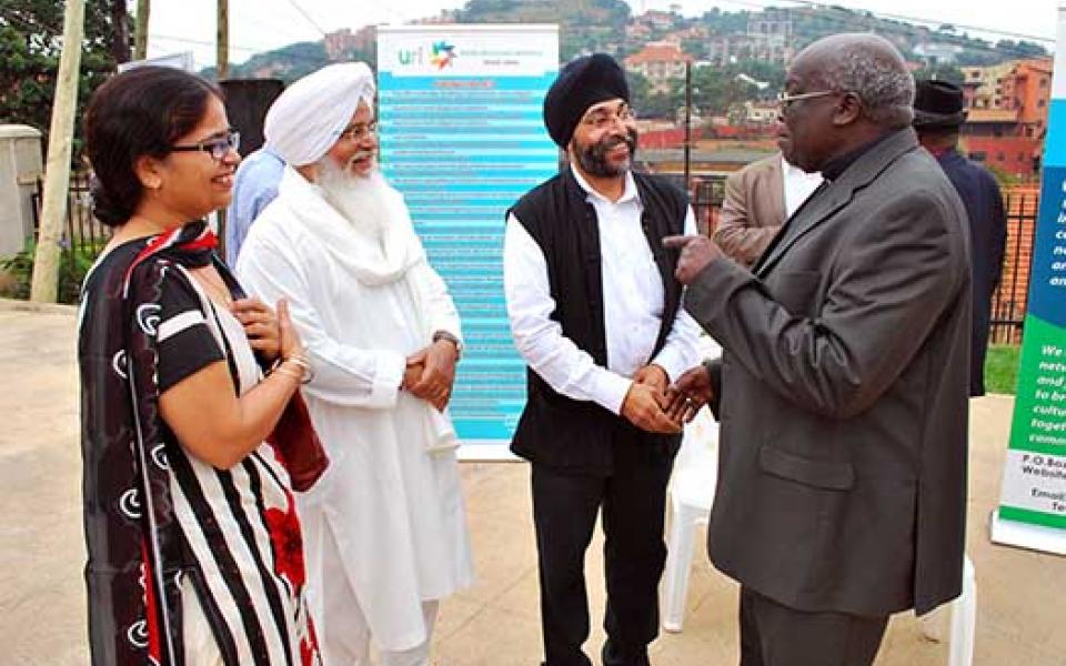 A light moment between Bishop Odama and the Sikh Chief Priest