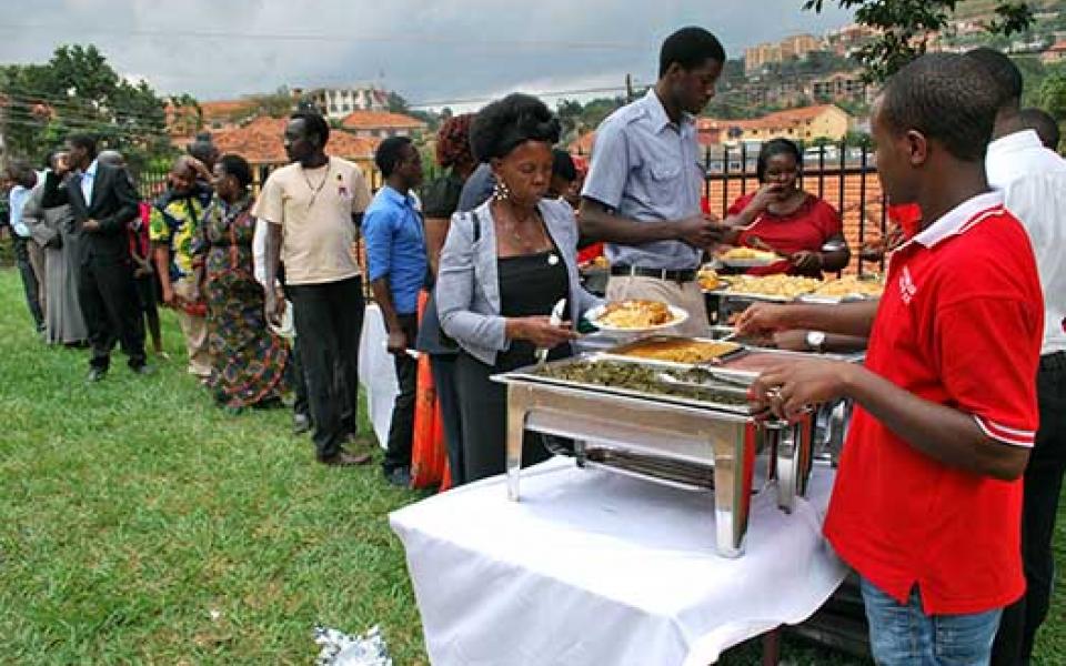 UgandaURI15-Sharing lunch.jpg