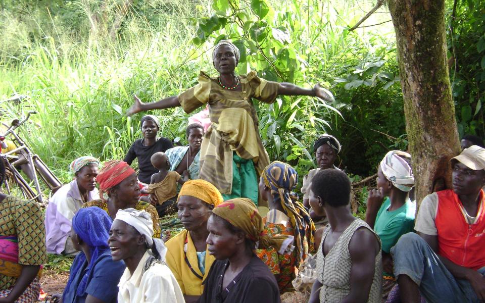 Ugandan woman stands