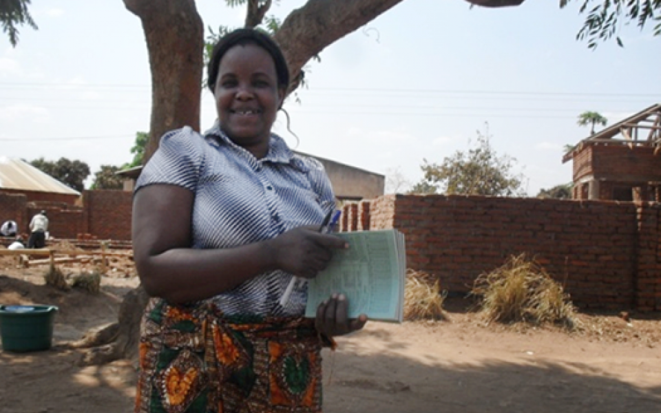 woman holding on a paper 