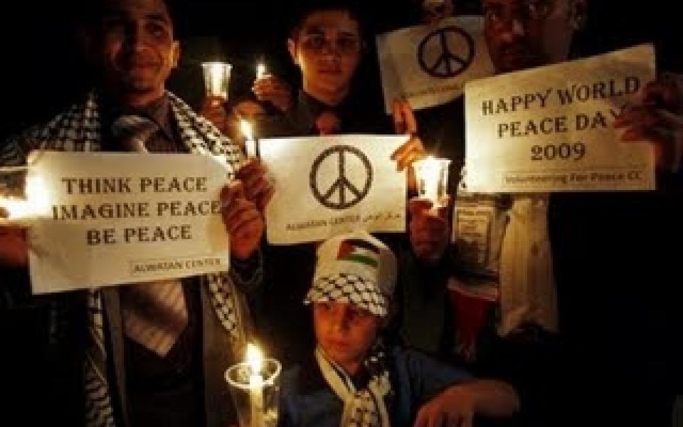 children holding peace signs in the west bank 
