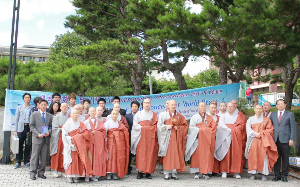korean religious men are in a group photo