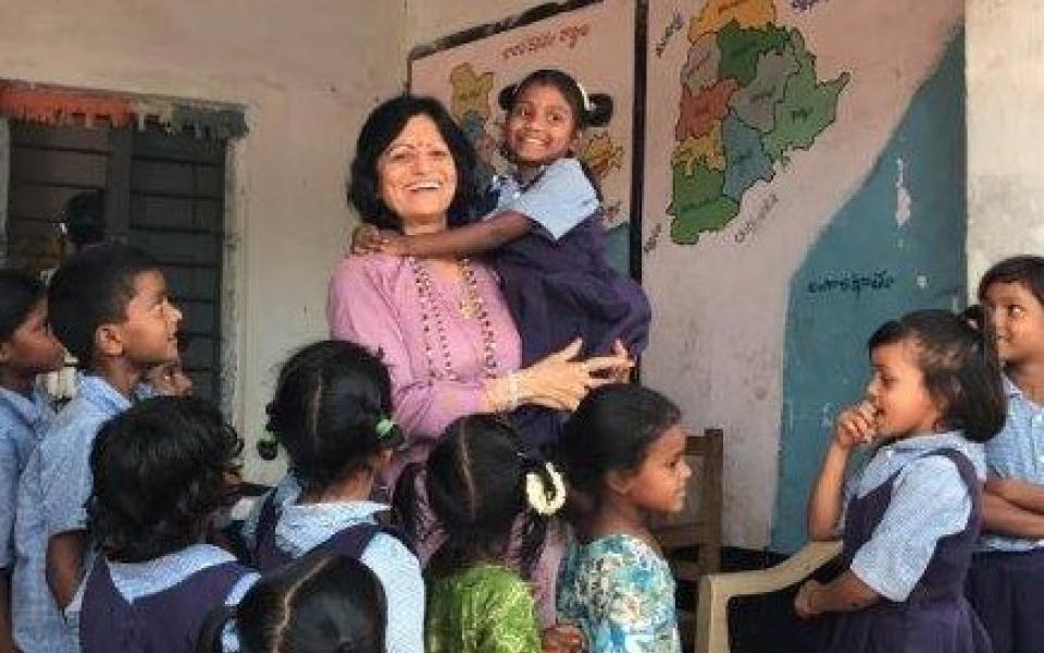 Satya with school children in India. 