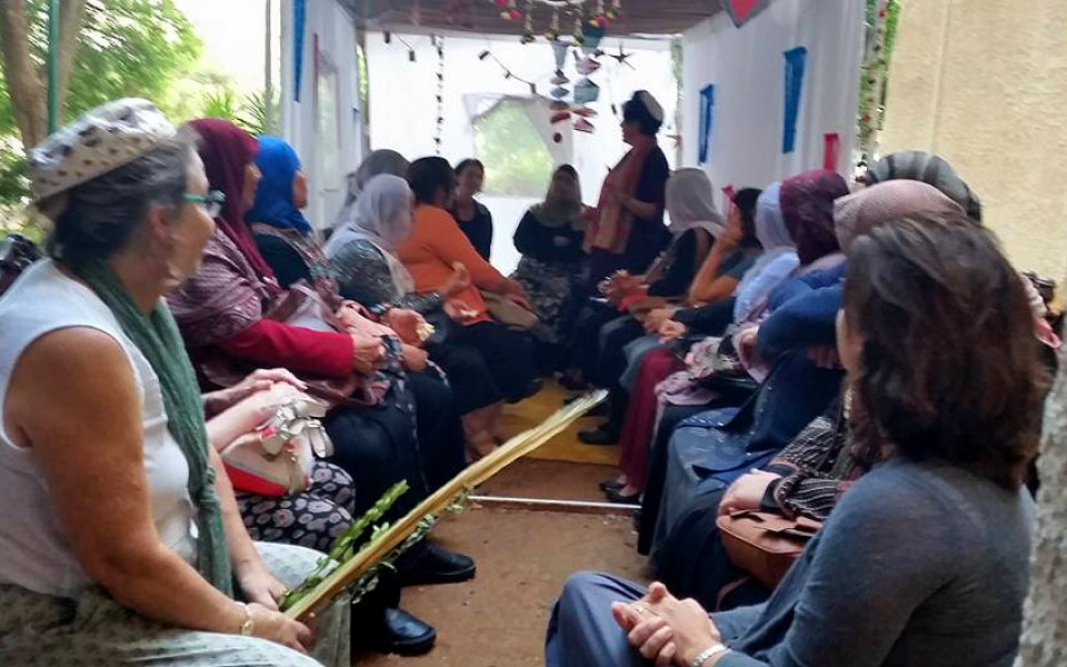 Photo of women sitting together