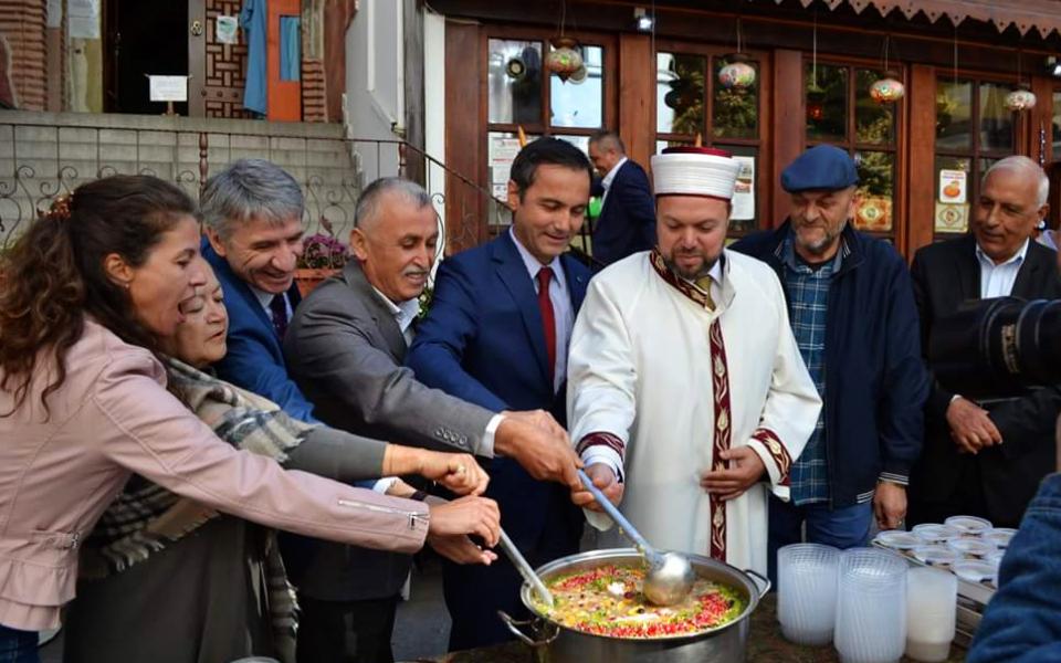 A group of people serving ashure in Plovdiv Bulgaria