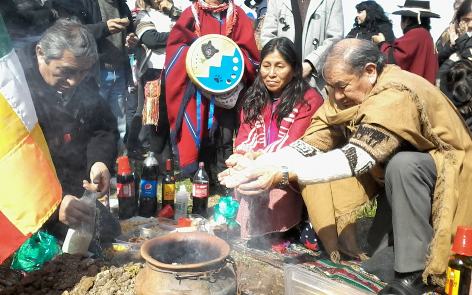 Photo: Rosalia, chief of the CC making the offering to the celebration