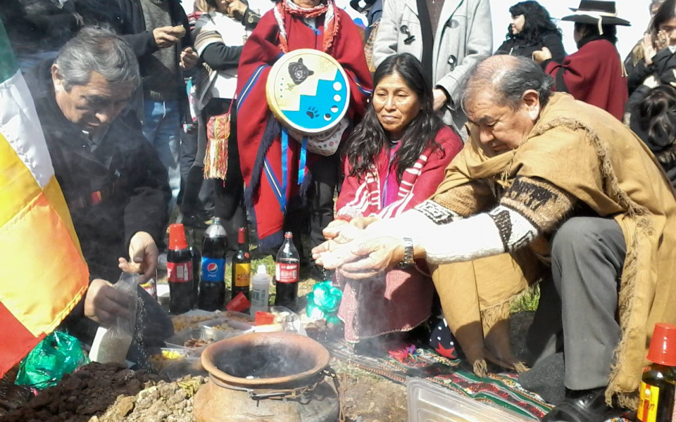 Photo: Rosalia, chief of the CC making the offering to the celebration 