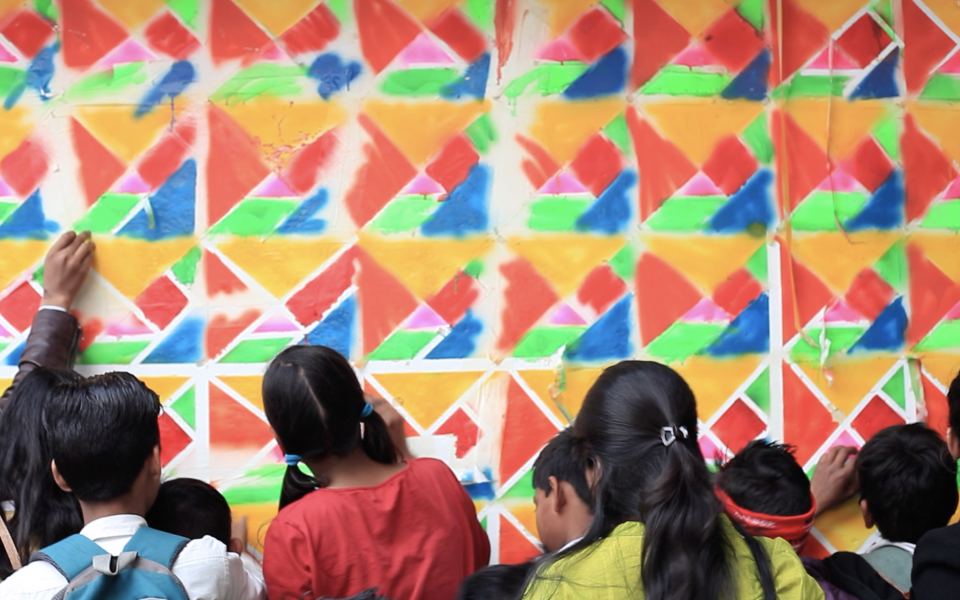 Photo: Children painting a wall
