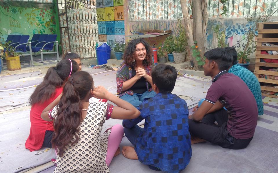 Photo: A group of kids learning 