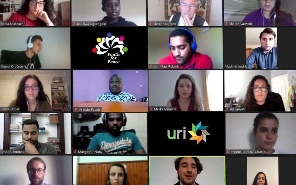 Photo: Screen shot of faces of young people in Zoom screens at the online event for International Youth Day