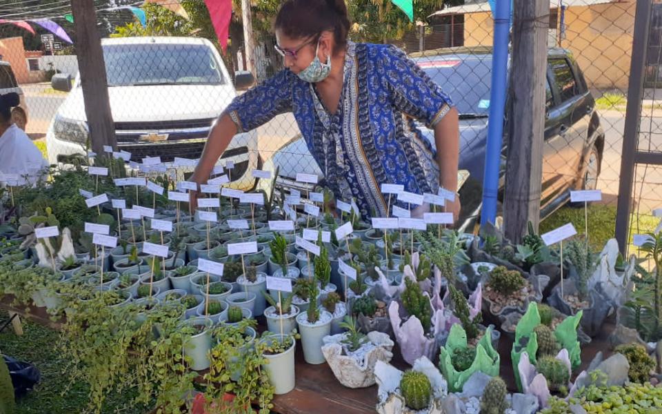 Photo: Woman selling seedles
