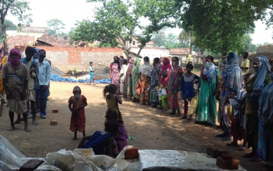 Distributing Food in Uporgoda Village