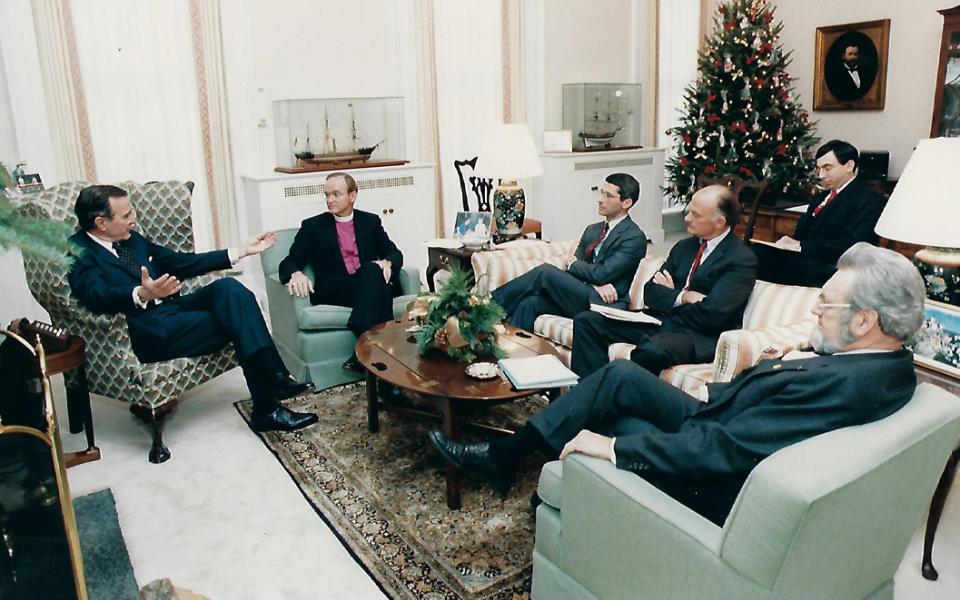 George H. W. Bush and Dr. Fauci with URI Founder and President The Rt. Rev. William E. Swing.