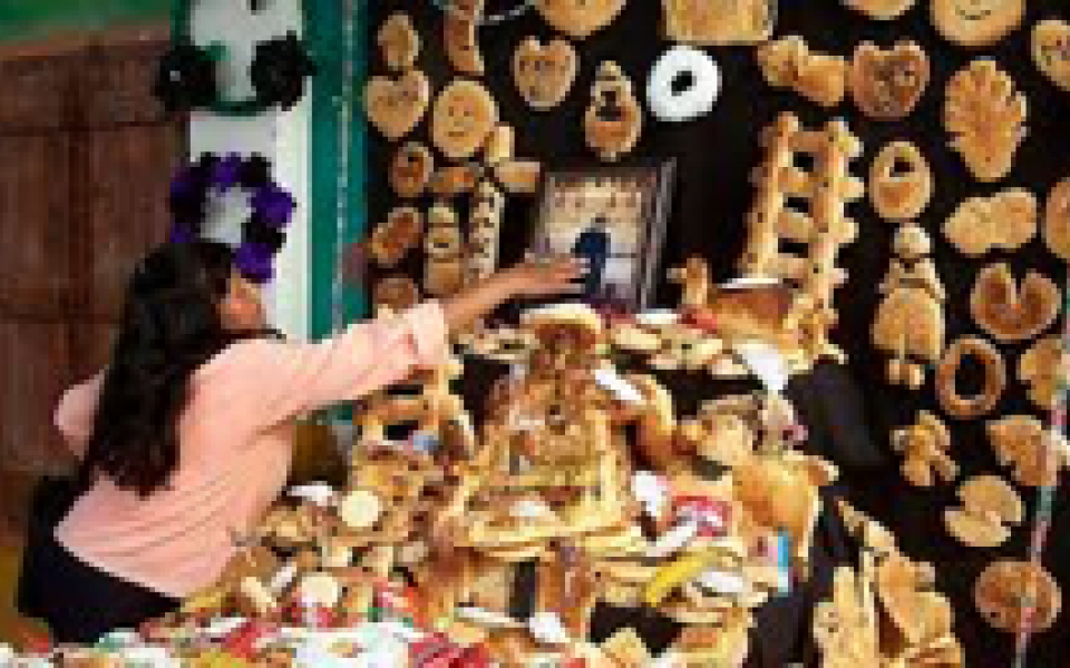 Photo: Woman taking some bread