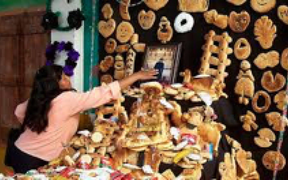 Photo: Woman taking some bread 