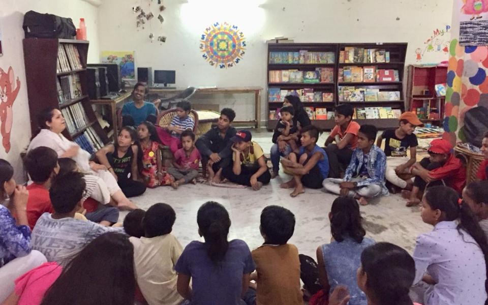 Photo: A group of children learning