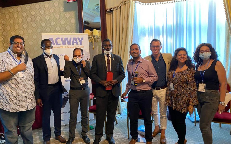 Picture: Participants of the Youth Interfaith Forum standing with Nasr-Eddin Mofarah, Minister of Religious Affairs for the Country of Sudan.