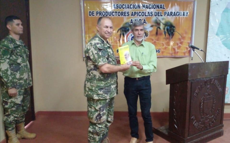 Photo: Member of the CC National Network of Agrarian Educators of Paraguay receiving certification.