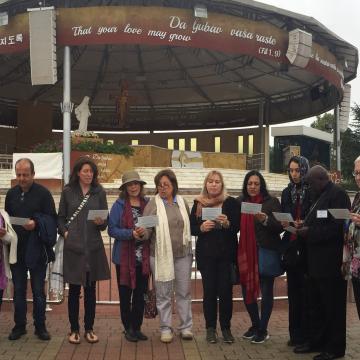 People reading The Nuclear Prayer in Medjugorje